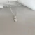 Colar Menino de Boné Cravejado em Micro Zircônia Cristal Pingente 15mm na internet