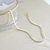 CHOKER FINA BAGUETE CRISTAL - DOURADO (PASSA LETRA) - comprar online