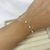 PULSEIRA PÉROLAS CORAÇÃO
