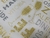 TNT estampado Mewi - Feliz Ano Novo Dourado Prata Metro - loja online