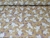 TNT Estampado Supper Páscoa Dourada Coelhinho Branco Metro