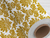 TNT estampado Mewi - Medalhão Dourado Fundo Branco Metro - comprar online