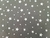 Imagem do TNT Estampado Mewi Estrela Prateada Fundo Preto Metro