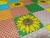 Imagem do TNT Estampado Mewi Poá Retalhos do Sol Girassol Festa Junina Metro