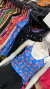PACOTE PROMOCIONAL COM 30 PCS VARIADAS ENTRE PMG LISAS E ESTAMPADAS (modelo alcinha)(NESTE PACOTE A BLUSA SAI A 10,00) - comprar online