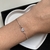 Pulseira ponto de luz coração