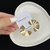 Brinco organic leque ouro 18k BR06