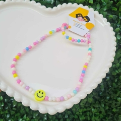 Kit colar + Pulseira - Flor e Rosto Feliz na internet