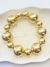 Pulseira bolas metálicas - DOURADO - comprar online