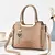 BOLSA ELEGANTE PINGENTE CORAÇÃO ABA TRANÇADA YNMY/ COD.B141