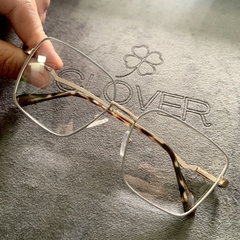 Clover Grau Metal square cinza/dourado na internet