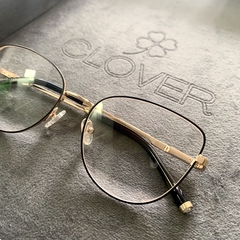 Imagem do Clover Grau Metal dourado/preto gatinho