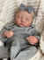 Arya Bebê Reborn Realista de 49cm, Pele em Silicone Suave e Flexível, Veias Detalhadas, Pintura Manual, Cabelos Encantadores e Expressão Serena - loja online