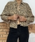 camisa animal print onça Zara