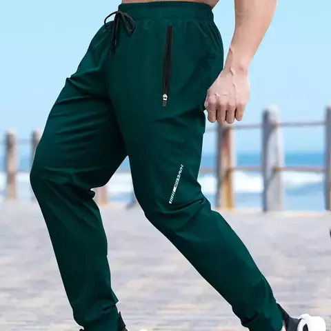 Calças de ginástica masculina calças de pista verão roupas masculinas marca - comprar online