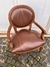 Sillón de sala en cuero marrón