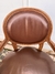 Sillón de sala en cuero marrón en internet