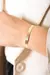 Bracelete fino riscos dourado