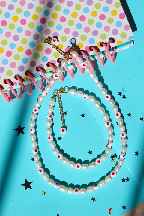 Corazones rojos con perla cultivada