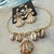 Conjunto de Concha com búzios de Resina Mesclada - comprar online