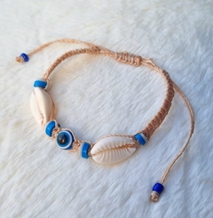 Pulseira/Tornozeleira de búzios. na internet