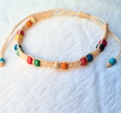 Pulseira/Tornozeleira ajustável com madeira colorida.