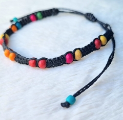 Pulseira/Tornozeleira ajustável com madeira colorida. na internet