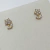 Brinco Flor Cristais Dourado na internet
