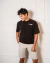 REMERA GLOW SPACE NEGRA