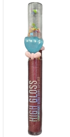 gloss huda vioji com gliter borboleta e anel tema de flor