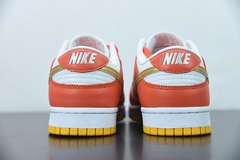 Tênis Nike Dunk Low University Gold - loja online