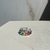 Piercing Fake Pedraria Colors na internet