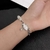Pulseira Olho de Gato com Pedra Acenando Frisado - loja online
