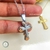 Imagem do Colar Crucifixo Oração Pai Nosso com Banho de Ouro 18K