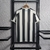 Camisa Newcastle I 22/23 Torcedor Castore Masculina - Preto + Branco - comprar online