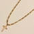 Colar Piastrine Grossa 60cm c/ crucifixo vazado banho ouro 18k (MASC1076) - comprar online