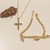 Conjunto Colar 45cm veneziana c/ crucifixo + brinco Ponto de Luz + Pulseira cartier c/ pingentes crucifixo banho Ouro 18k (MIX1091) - comprar online