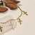 Pulseira Filete e Crucifixo 16cm + 3cm extensor banho ouro 18k (PUL1124) - comprar online