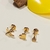 Trio de Brincos Flecha, Coração e Avião banho ouro 18k (TRIO1203) - comprar online