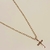 Colar Grumet fino 60cm c/ crucifixo vazado banho ouro 18k (MASC1073) na internet