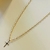Colar Cartier 60cm c/ Crucifixo vazado banho ouro 18k (MASC1070)