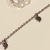 Tornozeleira 24cm 3 meia lua Aço Cirúrgico (TOR1099) - comprar online