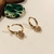 Brinco Argola Articulada Peq. 1,2mm c/ Pingente Coração cravejado Micro Zircônias banho ouro 18k (ARG1413) na internet