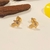 Brinco Mão de Fátima c/ caneta de Ródio banho ouro 18k (PQ1478) na internet
