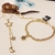 Conjunto Colar 42cm Gravatinha estrela e meia lua com brinco e pulseira de elos pingente estrela banho Ouro 18k (CJ1533)