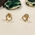 Brinco Peq. Coração vazado estilizado cravejado com 3 micro zircônias banho Ouro 18k (BR1627) - comprar online