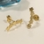 Brinco EarCuff 5 estrelas detalhe intrincado em 2 delas banho Ouro 18k (EAR1628)