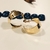 Brinco Argola Méd. com vinco central e abaulado com toque requintado nas laterais banho Ouro 18k (ARG1633) - comprar online