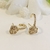 Brinco Méd. Flor e Caule ambos cravejados em micro zircônias Banho premium Ouro 18k (BR1639) - comprar online