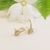 Brinco Méd. Flor e Caule ambos cravejados em micro zircônias Banho premium Ouro 18k (BR1639)